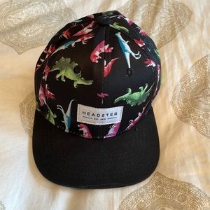 Headster cap. Black W/dinasours. Size - 52 cm (for my 3/4 year old)